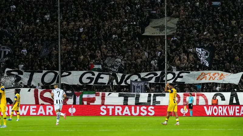 PAOK fans displayed a banner reading 'Stop genocide' during their match against Maccabi Tel Aviv