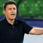 Iran coach Amir Ghalenoi is one of two people in Iran's delegation to travel to the US