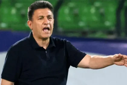 Iran coach Amir Ghalenoi is one of two people in Iran's delegation to travel to the US