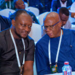Edmond Kombat and Tema Oil Refinery with SIGA Chair