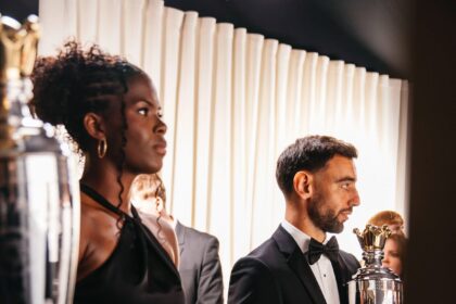 Manchester United captain Bruno Fernandes and Manchester City forward Khadija Shaw