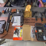 firearms and 610 rounds of ammunition concealed among personal effects in a consignment from the United States