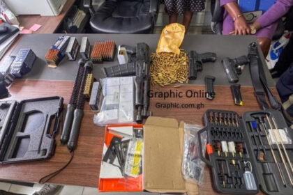 firearms and 610 rounds of ammunition concealed among personal effects in a consignment from the United States