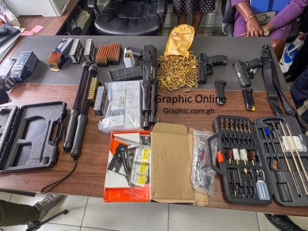 firearms and 610 rounds of ammunition concealed among personal effects in a consignment from the United States