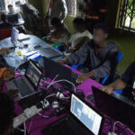 Arrested scammers are in custody